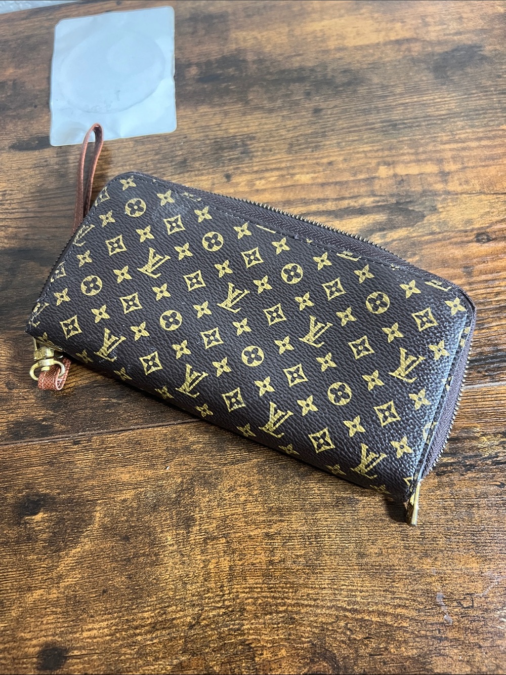 Brown and Gold Monogram Zip Wallet with Wrist Strap